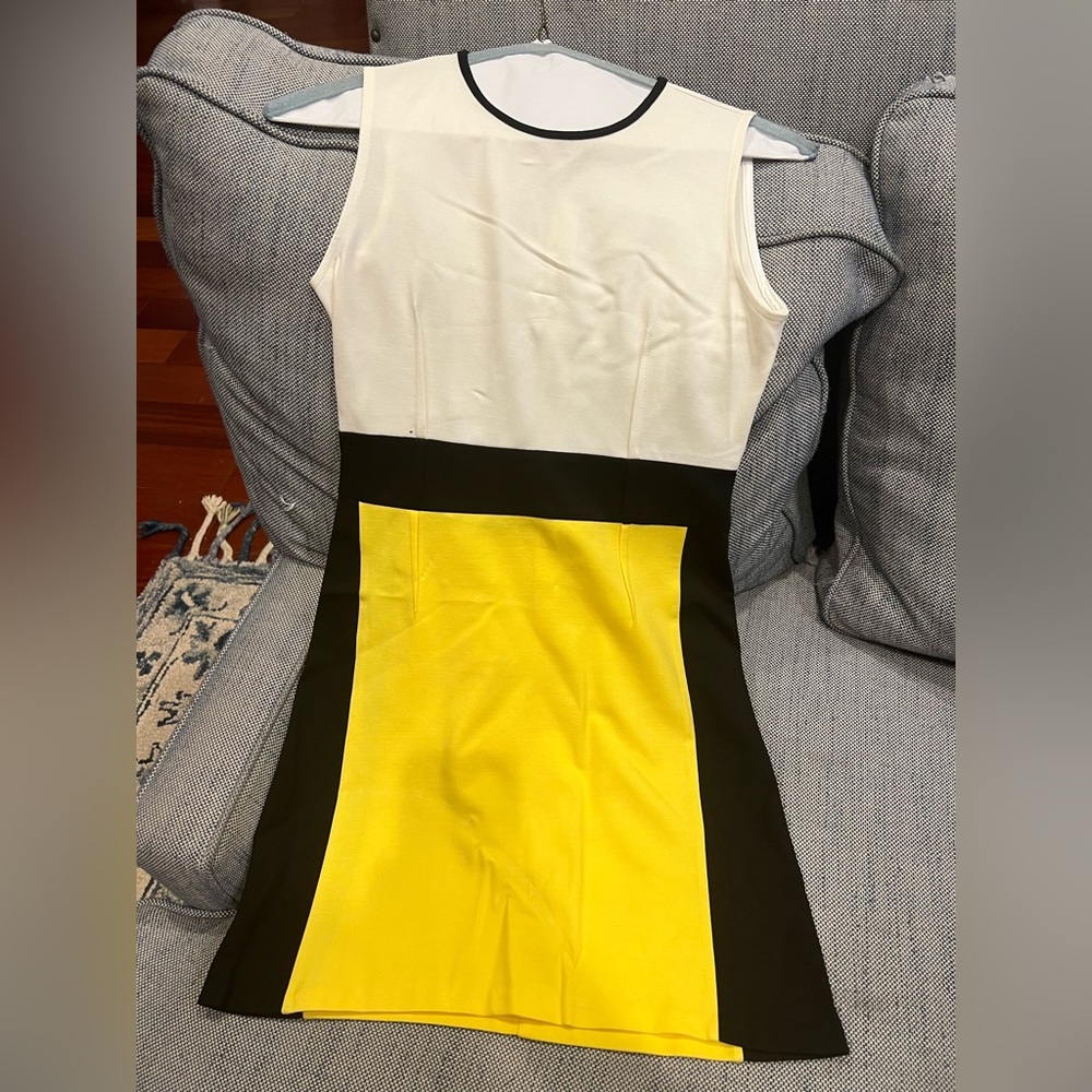 Cotton and polyester blend, fitted, short dress. Perfect for that summer drink.